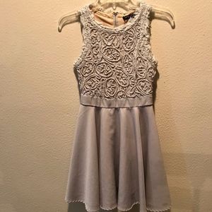 Romeo and Juliet couture Grey lace cocktail dress.
